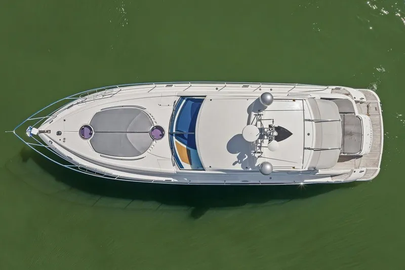 Slide: The Image of Overhead view of 2006 Fairline Targa 47 GT yacht on green water. - 10