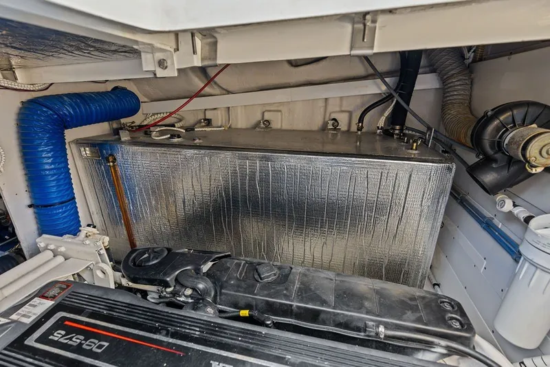 Slide: The Image of Engine compartment of 2006 Fairline Targa 47 GT with visible components and insulation. - 66