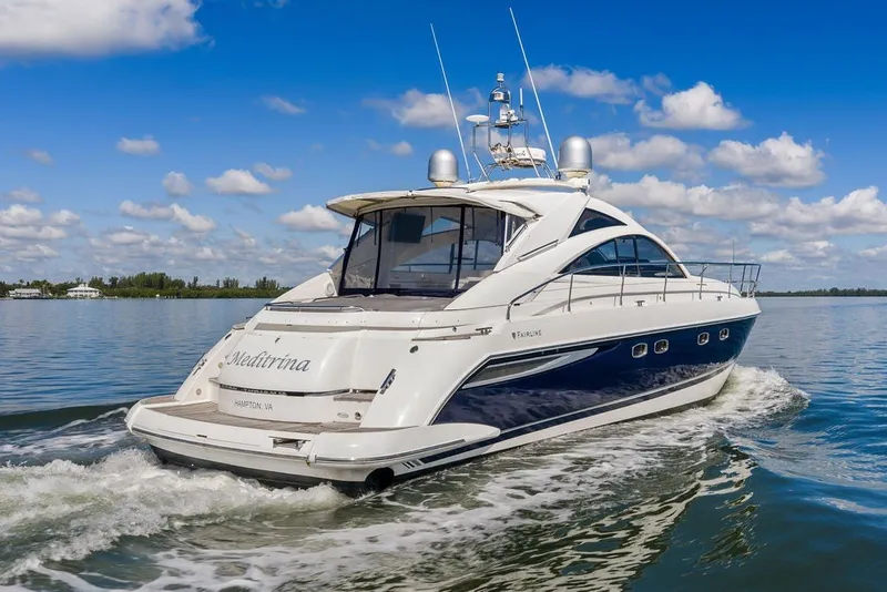 Slide: The Image of 2006 Fairline Targa 47 GT yacht cruising on a sunny day. - 18