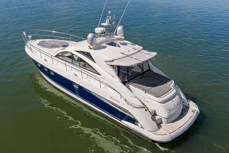 Slide: The Image of 2006 Fairline Targa 47 GT yacht cruising on calm waters. - 4