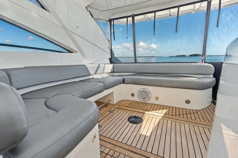 Slide: The Image of Luxurious interior of 2006 Fairline Targa 47 GT yacht with sleek seating and ocean view. - 32