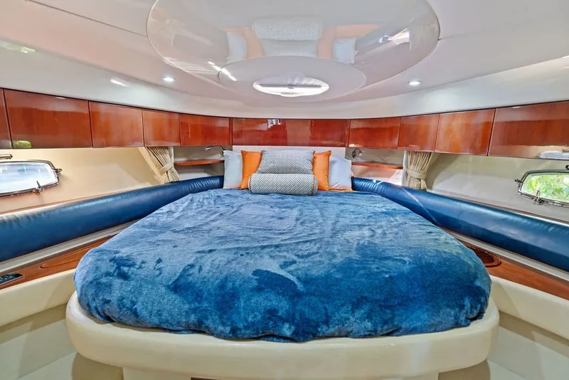 Slide: The Image of Luxurious cabin interior of 2006 Fairline Targa 47 GT yacht with plush bedding. - 53