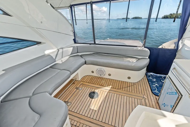 Slide: The Image of Interior of 2006 Fairline Targa 47 GT yacht with elegant seating and ocean view. - 31