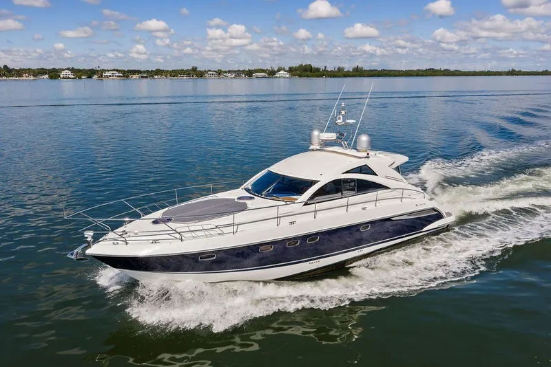 Slide: The Image of 2006 Fairline Targa 47 GT yacht cruising on a calm, sunny day. - 12