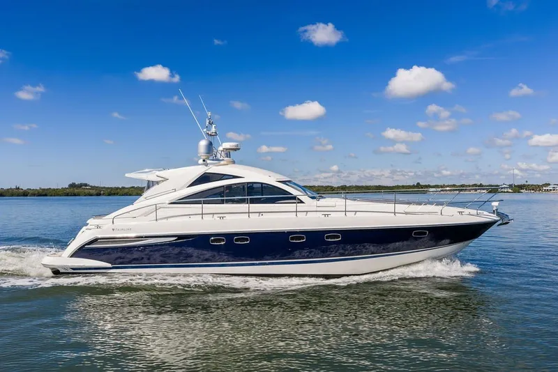 Slide: The Image of 2006 Fairline Targa 47 GT yacht cruising on a calm, sunny day. - 16