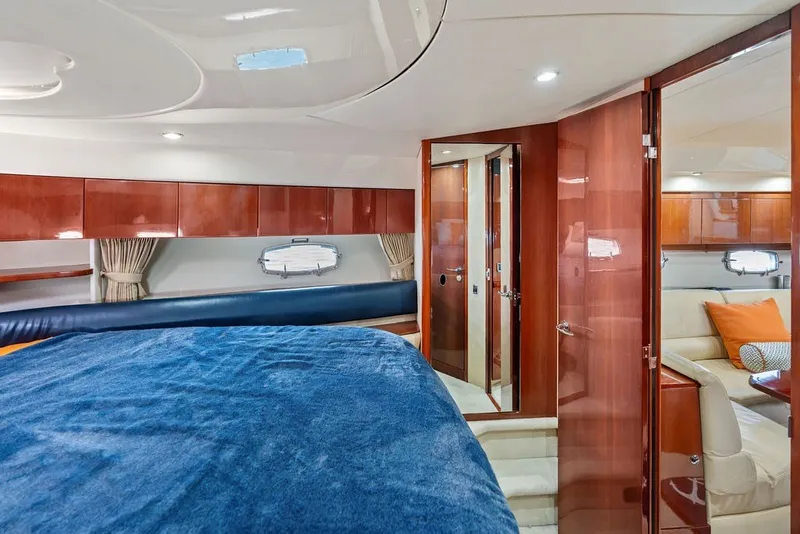 Slide: The Image of Luxurious interior of 2006 Fairline Targa 47 GT yacht with wood finishes and cozy seating. - 54