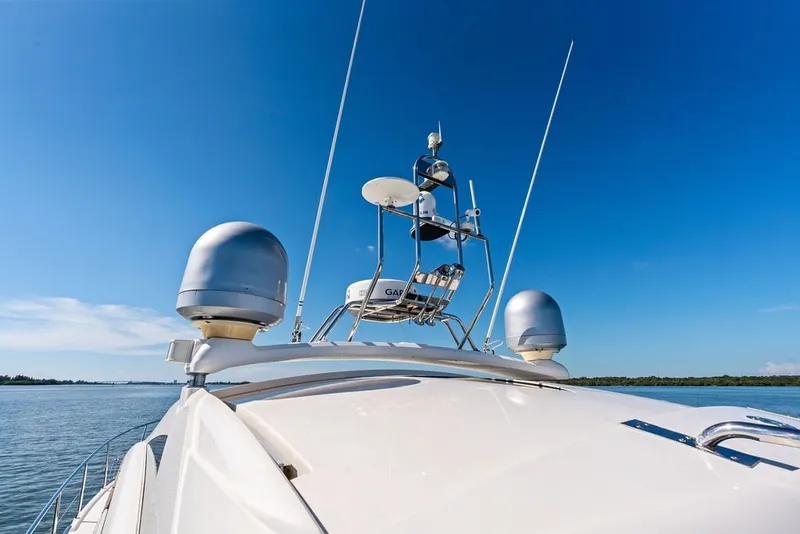 Slide: The Image of 2006 Fairline Targa 47 GT yacht with radar equipment against clear blue sky. - 20