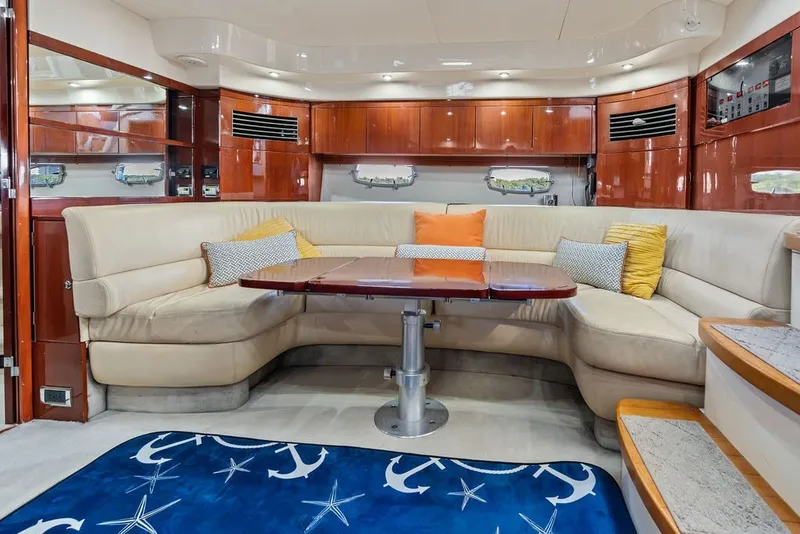 Slide: The Image of Luxurious interior of 2006 Fairline Targa 47 GT yacht with plush seating and elegant decor. - 50