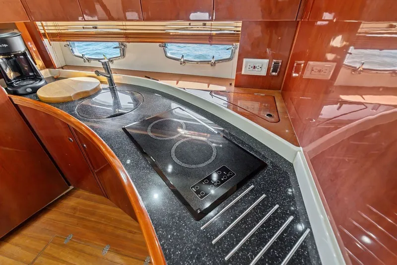 Slide: The Image of Luxurious kitchen interior of 2006 Fairline Targa 47 GT yacht with modern appliances. - 47