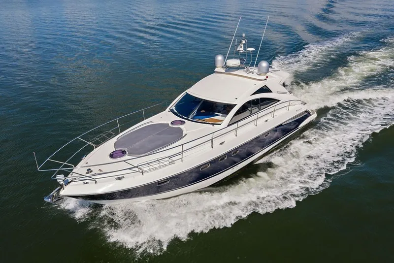 Slide: The Image of 2006 Fairline Targa 47 GT yacht cruising on open water. - 13