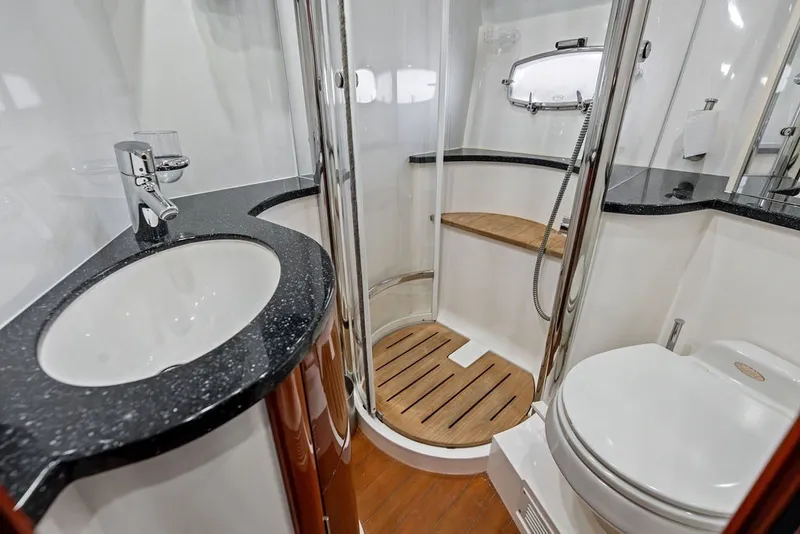 Slide: The Image of Luxurious bathroom in 2006 Fairline Targa 47 GT yacht with modern fixtures and elegant design. - 55