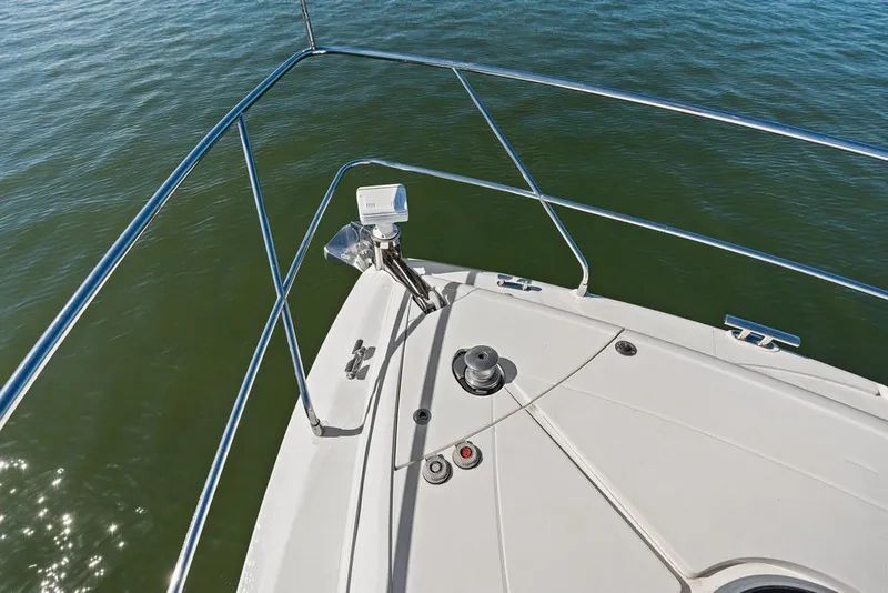 Slide: The Image of Bow of 2006 Fairline Targa 47 GT yacht on calm water. - 22