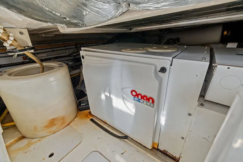 Slide: The Image of Engine room of 2006 Fairline Targa 47 GT with Onan generator. - 65