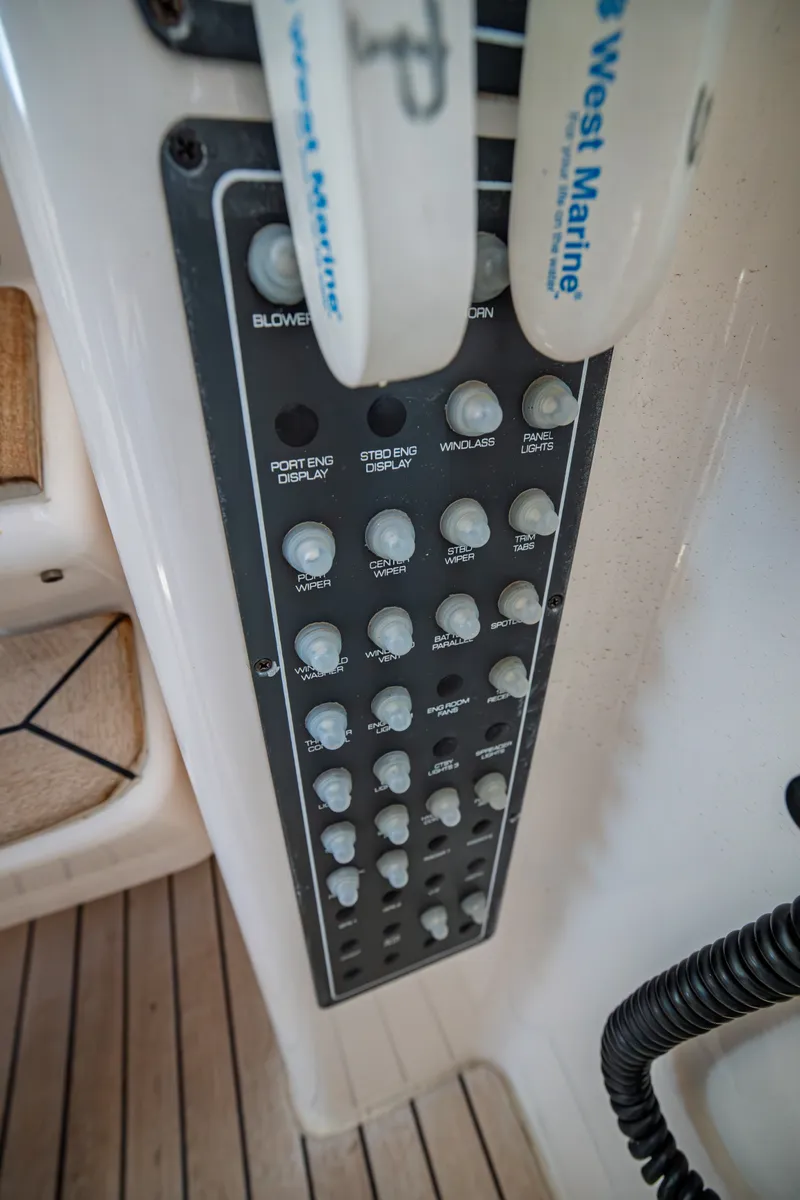 Slide: The Image of Close-up of a control panel with various switches and displays on a yacht. - 17