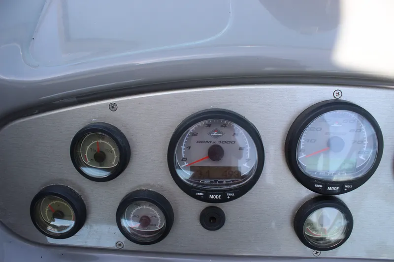 Slide: The Image of Dashboard gauges of a 2007 Cruisers Yachts 340 Express boat. - 21