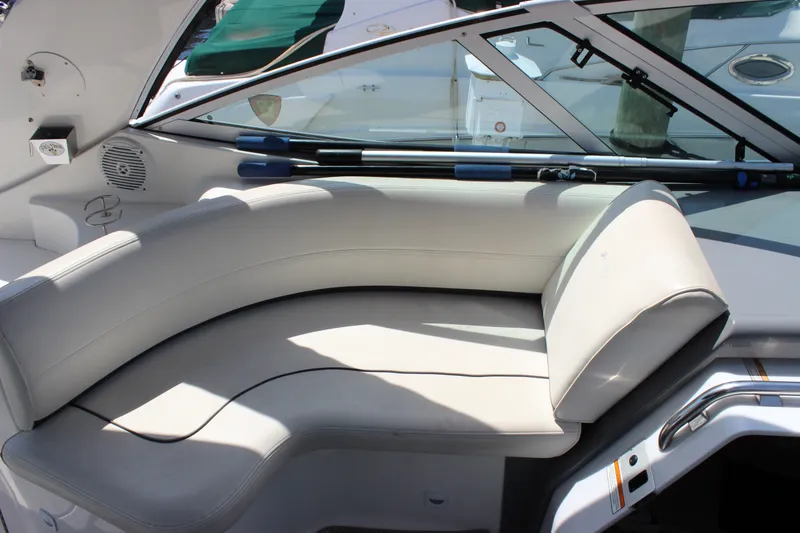 Slide: The Image of 2007 Cruisers Yachts 340 Express interior seating with sleek design and comfortable upholstery. - 17