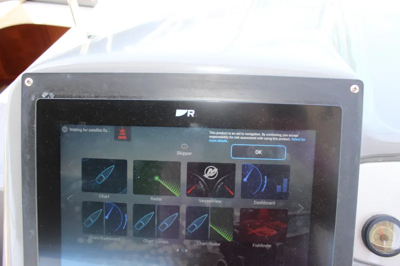 Slide: The Image of Navigation display on 2007 Cruisers Yachts 340 Express, showing charts and radar interface. - 18