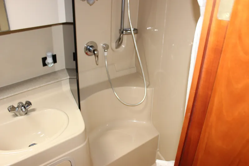 Slide: The Image of Bathroom interior of 2007 Cruisers Yachts 340 Express with shower and sink. - 40
