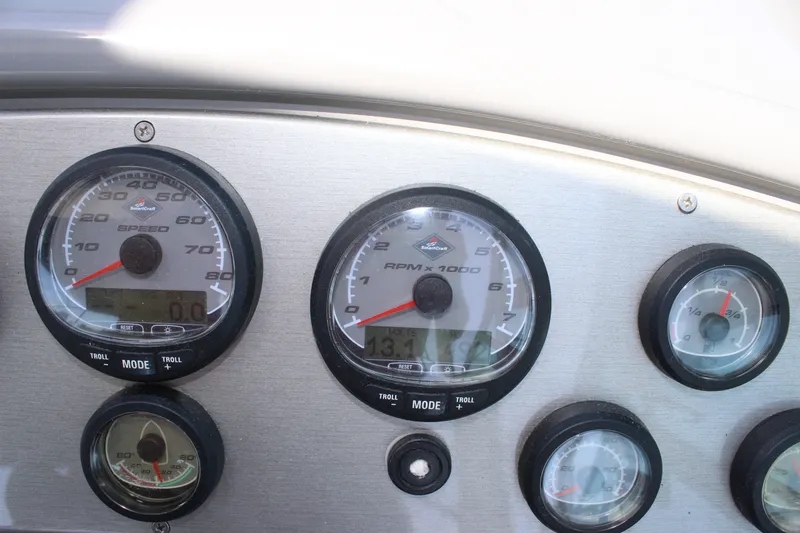 Slide: The Image of Dashboard gauges of a 2007 Cruisers Yachts 340 Express boat. - 20