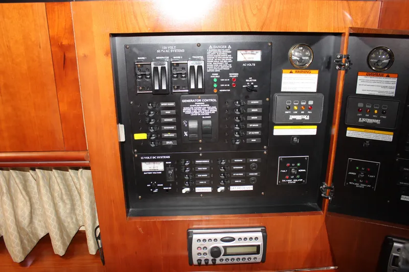 Slide: The Image of Electrical control panel on a 2007 Cruisers Yachts 340 Express boat. - 39