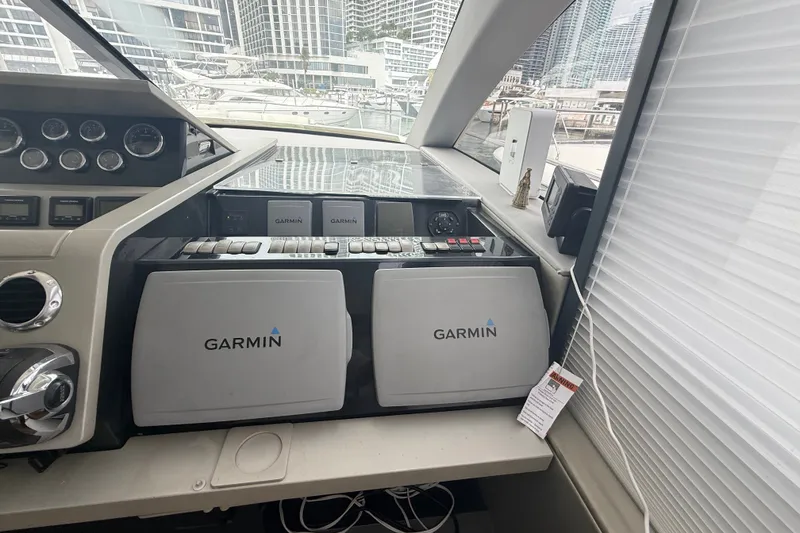 Slide: The Image of Cockpit of 2012 Fairline Targa 58 yacht with Garmin navigation systems. - 72