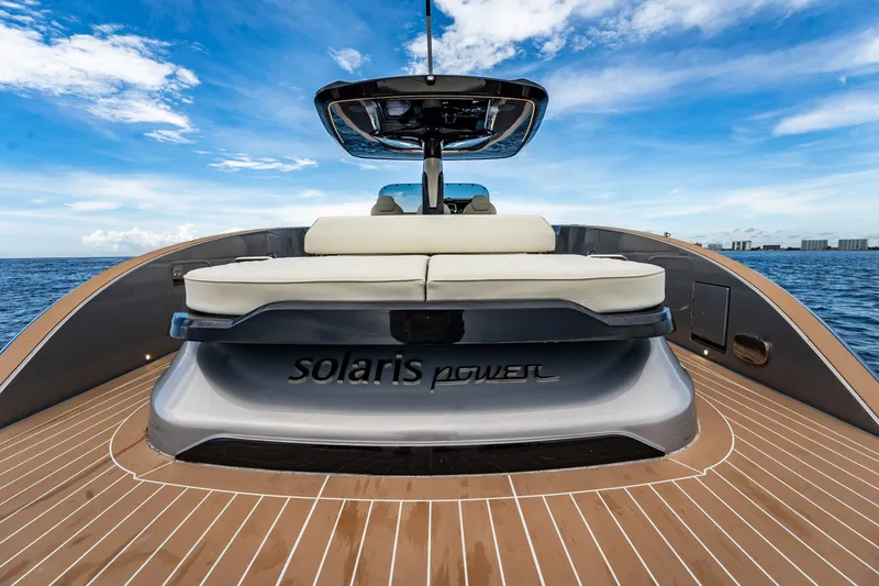 Slide: The Image of 2024 Solaris Power 40F Open yacht with sleek design and luxurious seating on open water. - 31