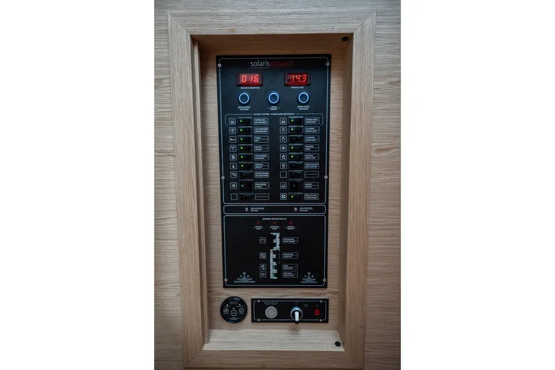 Slide: The Image of 2024 Solaris Power 40F Open control panel with digital displays and switches. - 30
