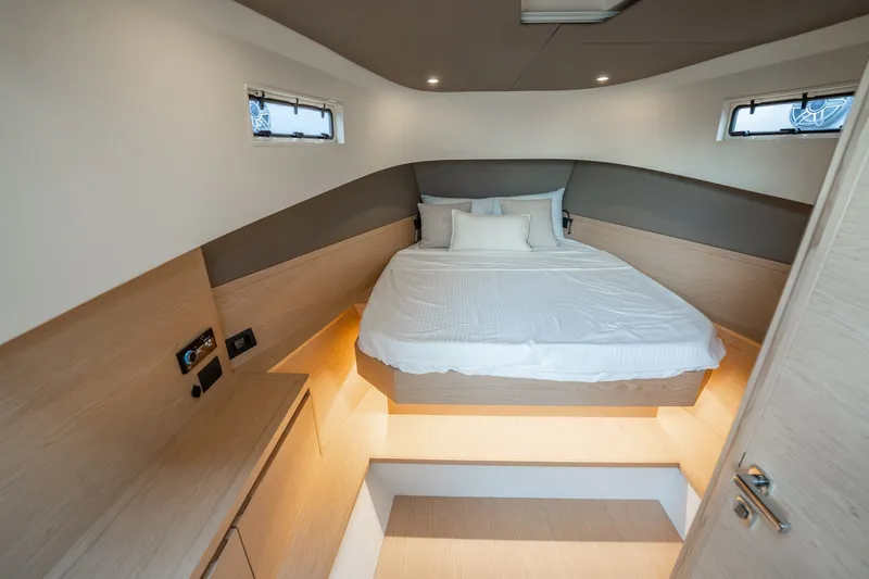 Slide: The Image of Luxurious cabin interior of 2024 Solaris Power 40F Open yacht with cozy bed. - 20