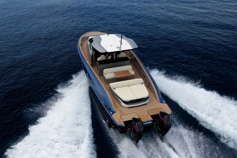 Slide: The Image of 2024 Solaris Power 40F Open yacht cruising on open water, showcasing sleek design and luxury. - 52