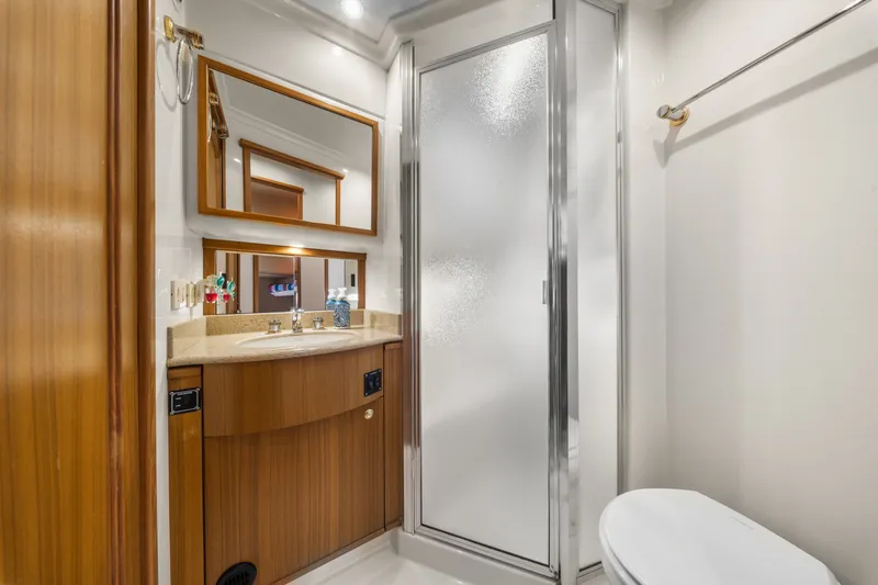 Slide: The Image of Luxurious bathroom in 2001 Bayliner 5788 Pilot House Motoryacht with shower and vanity. - 39