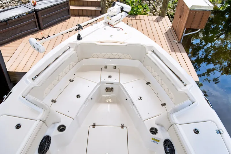 Slide: The Image of 2021 Blue Wave 2800 Makaira boat interior with seating and storage compartments. - 38