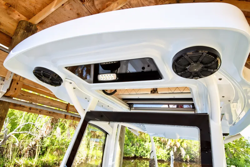 Slide: The Image of The image shows a boat's roof with speakers and lighting. - 37