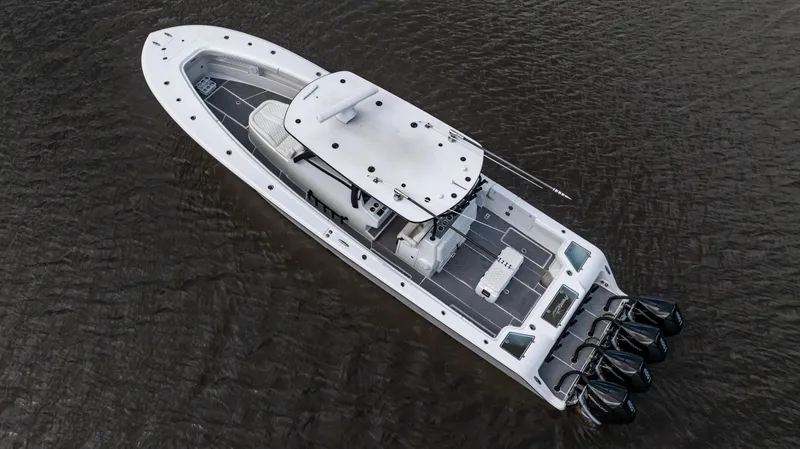 Slide: The Image of 2023 Front Runner 39 Center Console boat on water, aerial view. - 2