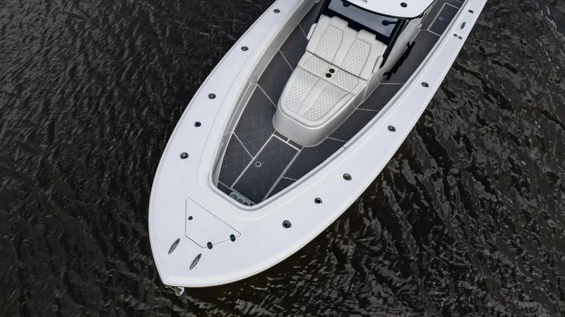 Slide: The Image of 2023 Front Runner 39 Center Console boat on water, aerial view. - 4