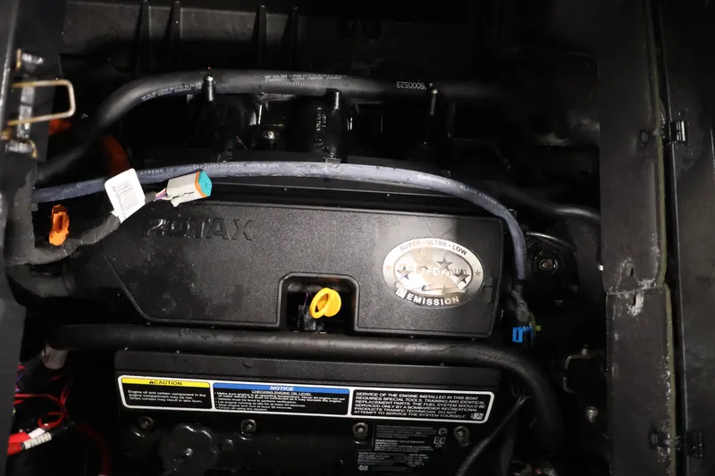 Slide: The Image of 2023 Sea-Doo Switch 16 engine compartment showcasing Rotax engine components. - 22