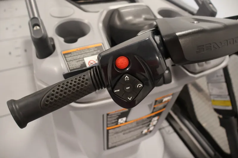 Slide: The Image of Close-up of 2023 Sea-Doo Switch 16 handlebar controls with buttons and grip. - 15