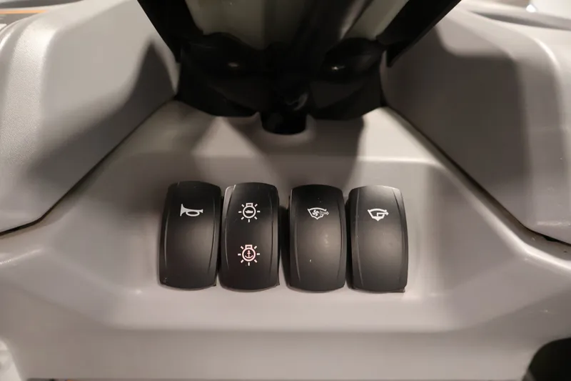 Slide: The Image of Dashboard controls of 2023 Sea-Doo Switch 16, featuring various function buttons. - 17