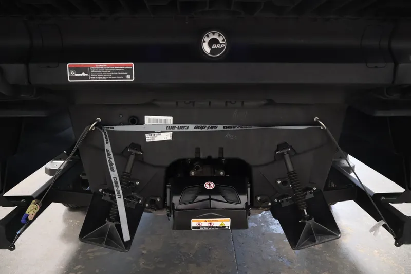 Slide: The Image of Rear view of 2023 Sea-Doo Switch 16, showcasing mechanical components and BRP logo. - 27