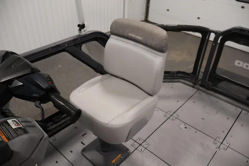 Slide: The Image of 2023 Sea-Doo Switch 16 interior with steering and seating detail. - 20