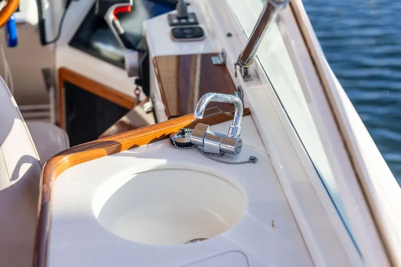 Slide: The Image of 2018 Hunt Yachts Harrier 26 interior with sink and faucet detail. - 21