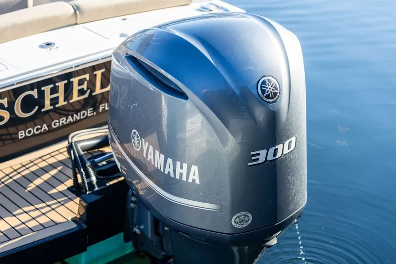 Slide: The Image of 2018 Hunt Yachts Harrier 26 with Yamaha 300 outboard engine on calm water. - 30
