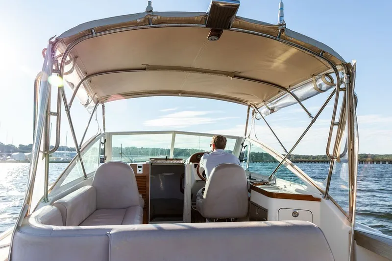 Slide: The Image of 2018 Hunt Yachts Harrier 26 cruising on a sunny day, view from the rear. - 17