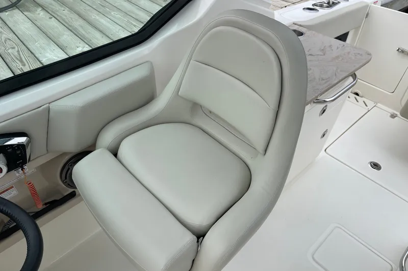 Slide: The Image of 2023 Boston Whaler 240 Vantage boat interior with plush seating and modern design. - 56