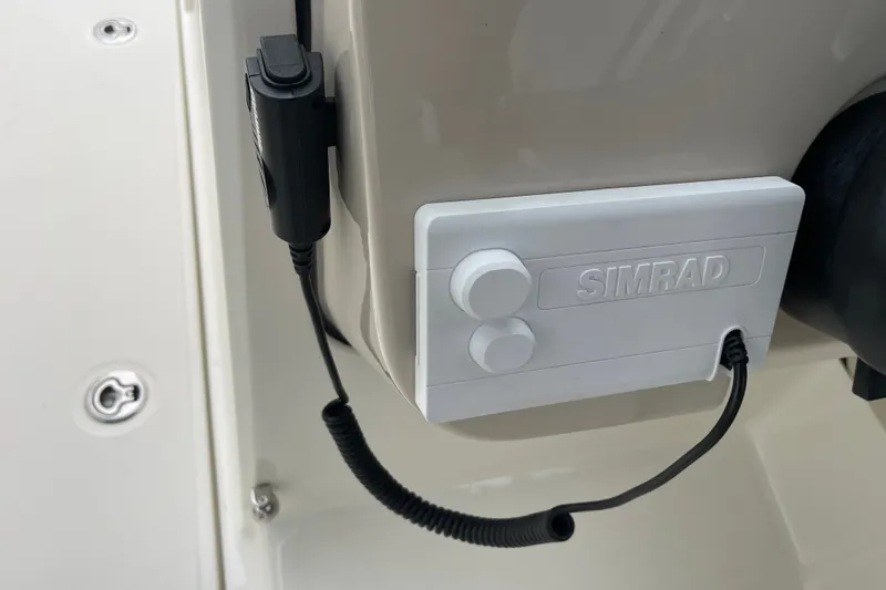 Slide: The Image of Simrad control panel on 2023 Boston Whaler 240 Vantage boat. - 58