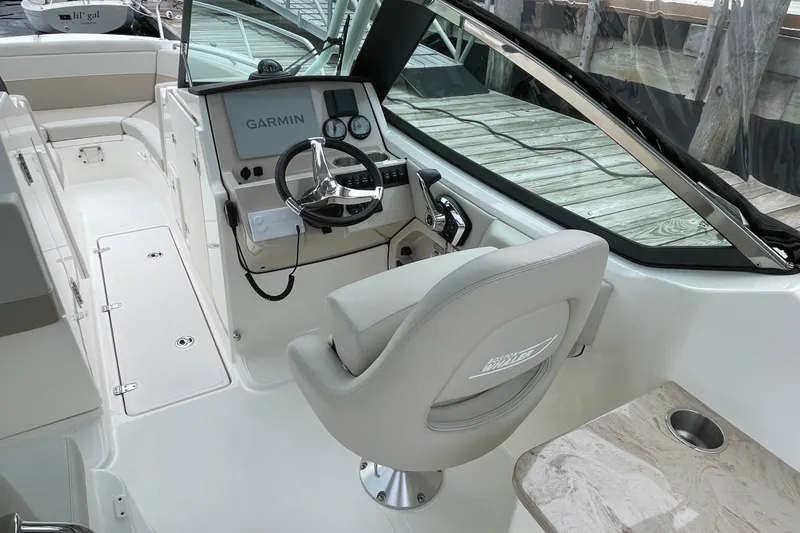 Slide: The Image of 2023 Boston Whaler 240 Vantage helm with Garmin navigation system and comfortable seating. - 42