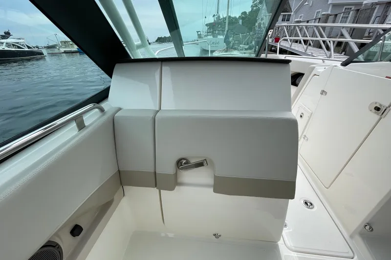 Slide: The Image of 2023 Boston Whaler 240 Vantage interior, featuring sleek seating and modern design elements. - 49