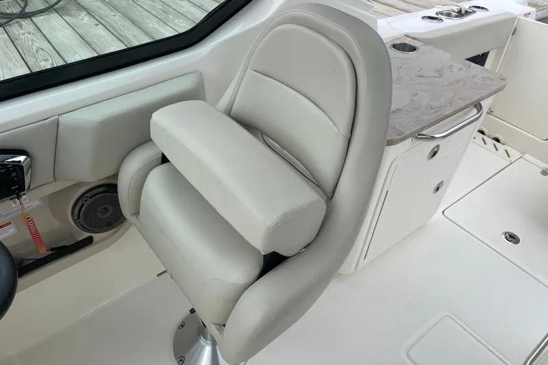 Slide: The Image of 2023 Boston Whaler 240 Vantage boat interior with luxurious seating and modern design. - 55