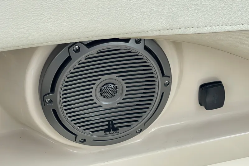 Slide: The Image of Speaker and USB port on 2023 Boston Whaler 240 Vantage boat interior. - 48
