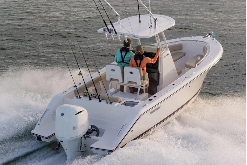 Slide: The Image of Manufacturer Provided Image: 2017 Pursuit C 238 Center Console boat cruising on water. - 4