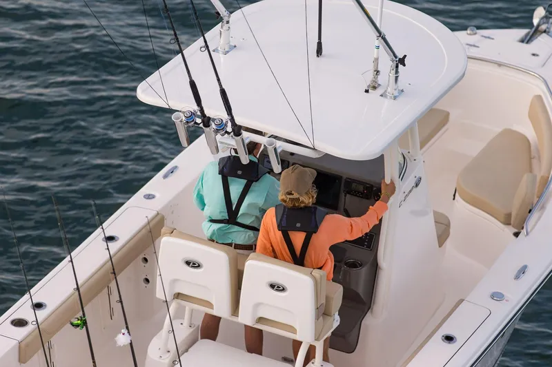 Slide: The Image of Manufacturer Provided Image: 2017 Pursuit C 238 Center Console boat with two people fishing. - 5